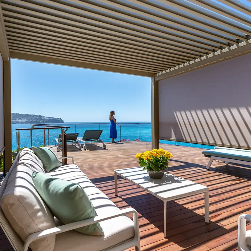 Minimalist bioclimatic pergola integrated into contemporary architecture